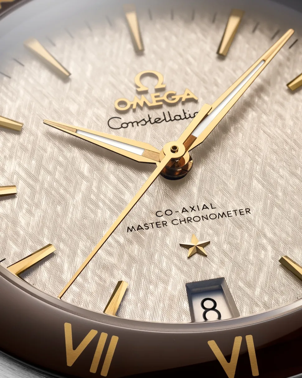 41 mm, Stahl ‑ Gelbgold mit Lederarmband