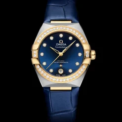 36 mm, Stahl ‑ Gelbgold mit Lederarmband